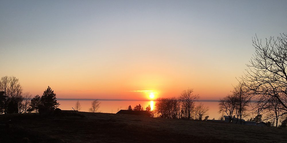 Naturbild vid Kråkeryd solnedgång över sjön Vättern